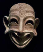 A grotesque terracotta mask