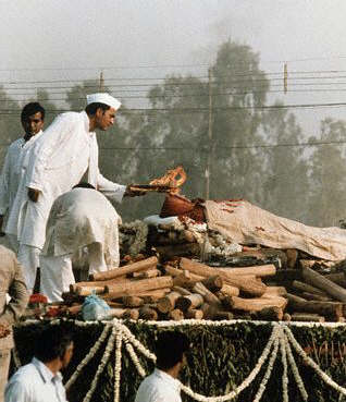 Lighting the Funeral Pyre. New Delhi, India