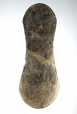Votive Sandal With Carved Decorations