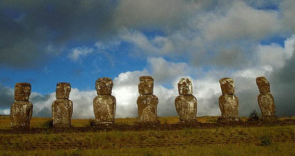 Seven stone moai statues facing the sea at Ahu Akivi, Easter Island