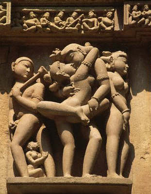 Erotic figures adorns the exterior of the Lakshmana Temple