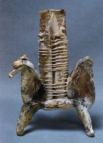 Side View of an Islamic Glass Double Span of Horses, ca. 6th-8th century