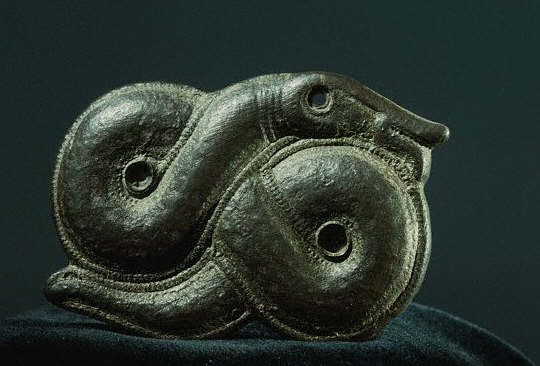 A Viking brooch. It represents the World Serpent. 7th century