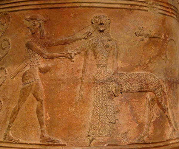 Perseus averts his gaze as he kills Medusa as a female centaur
