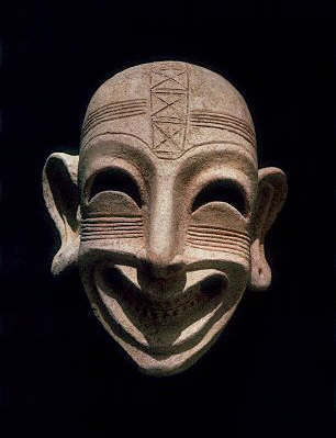 A grotesque terracotta mask