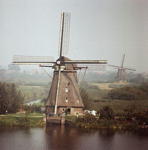Two windmills on the polders in the Kinderdijk region of the Netherlands
