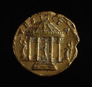 The colonnaded structure on the coin is a temple dedicated to Vesta