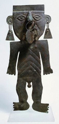 Peruvian Figure of a Tribesperson with Ear and Nose Ornaments ca. 1000 BC