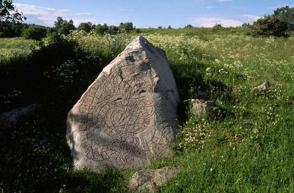 A rune stone in the garden of an ancient temple, Sweden