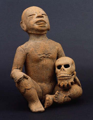 Huastec Sculpture of a Priest Wearing the Skin of a Sacrificed Victim 600-800 AD