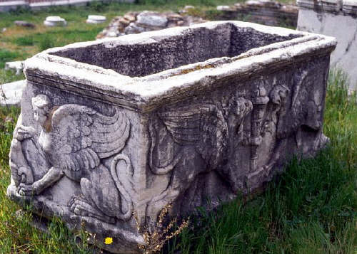 Ancient Sarcophagus With Griffins and Sphinx
