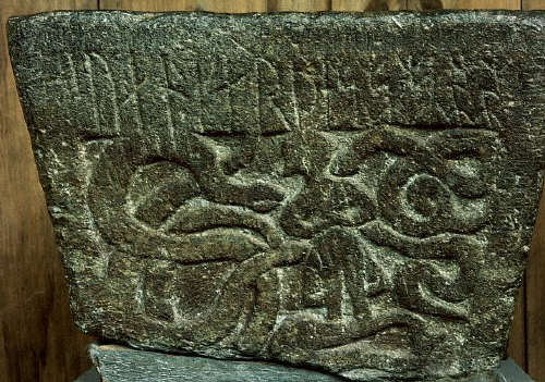 The relief sculpture depicts Gunnar, trapped in a pit of snakes