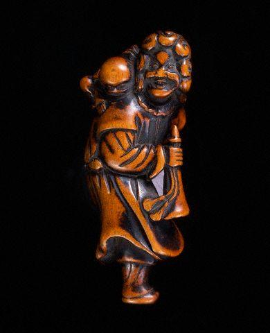 19th Century Japanese Netsuke Depicting an Ainu Mother and Child