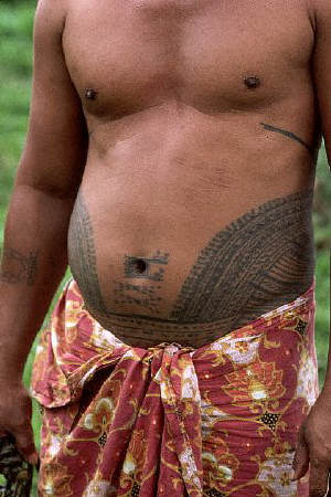 Tattoos on the stomach of Tolu, a village Chief in Western Samoa