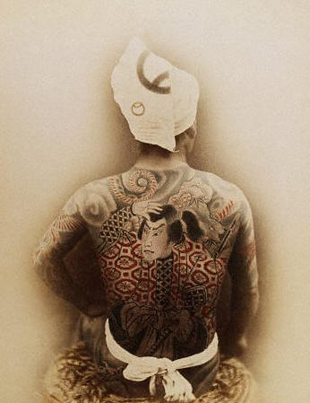 An elaborate tattoo of a samurai
