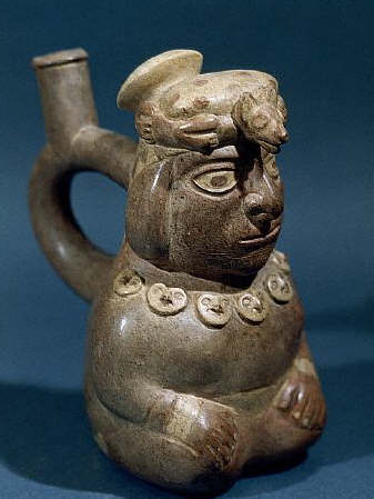 Vicus Stirrup Spout Bottle in the Form of a Seated Shaman