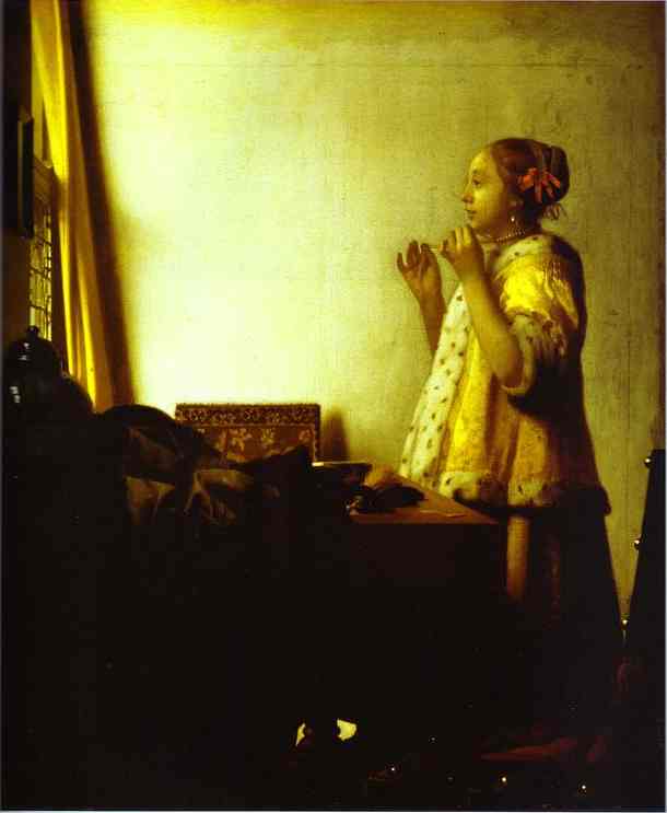 Jan Vermeer. Woman with a Pearl Necklace. c.1664
