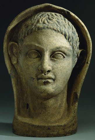 An Etruscan Terracotta Votive Male Head, Circa 4th-3rd Century B.C.
