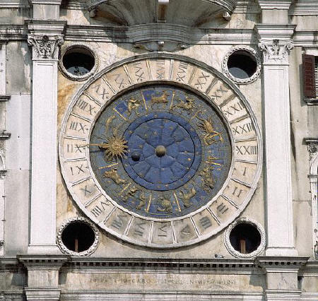 Signs of the Zodiac embellish the clock face on the Torre dell' Orologio bell tower in St. Mark's Square, Venice